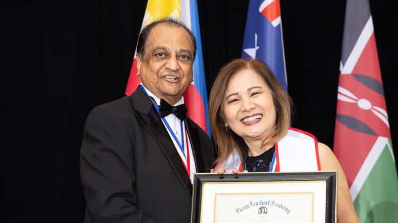 Cecile Sebastian receives her plaque at the meeting in New Orleans photo